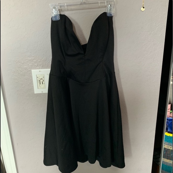 low cut black cocktail dress